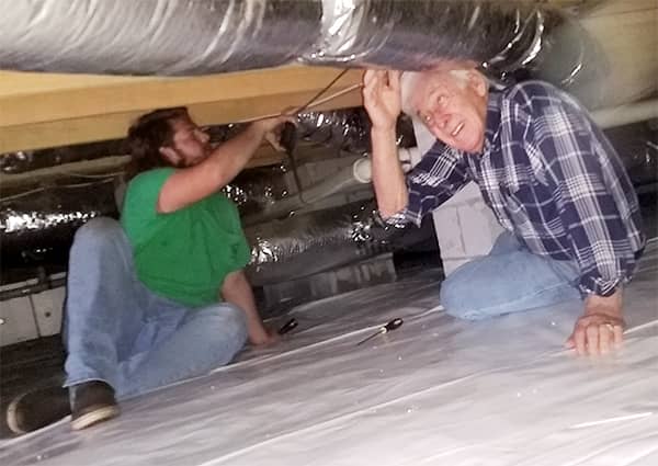 Two Home Inspectors at a Home Inspection